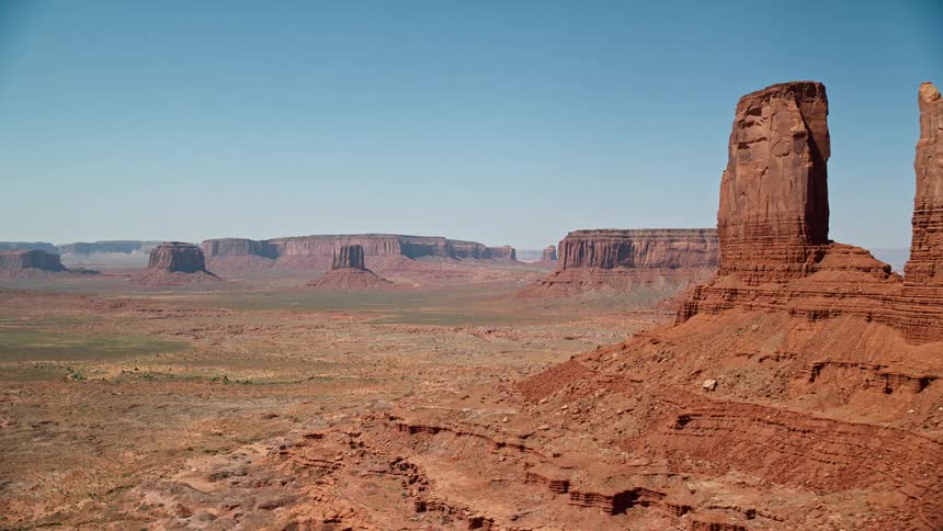 Aerial view of desert plateau with hills and a rocky terrain