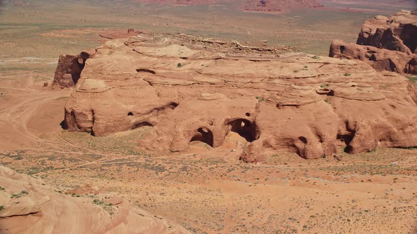 Clay formation with holes on a sunny day