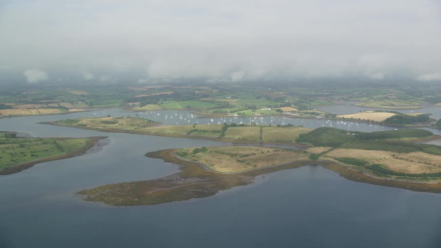 Aerial view of a river with boats and small islands