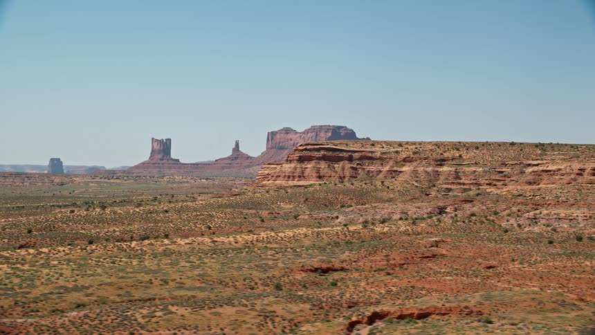 View of a valley with a river and geological rock formations