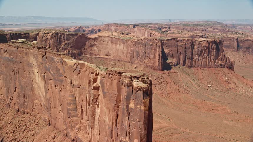 Aerial view of desert plateau with hills and a rocky terrain