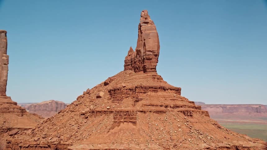 Red rock formations mesas and plateaus against blue skies