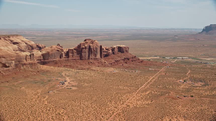 Aerial view of a valley and cliffs with geological formations