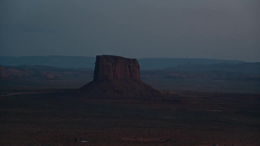 Landscape of a mesa on a flat land at sunset