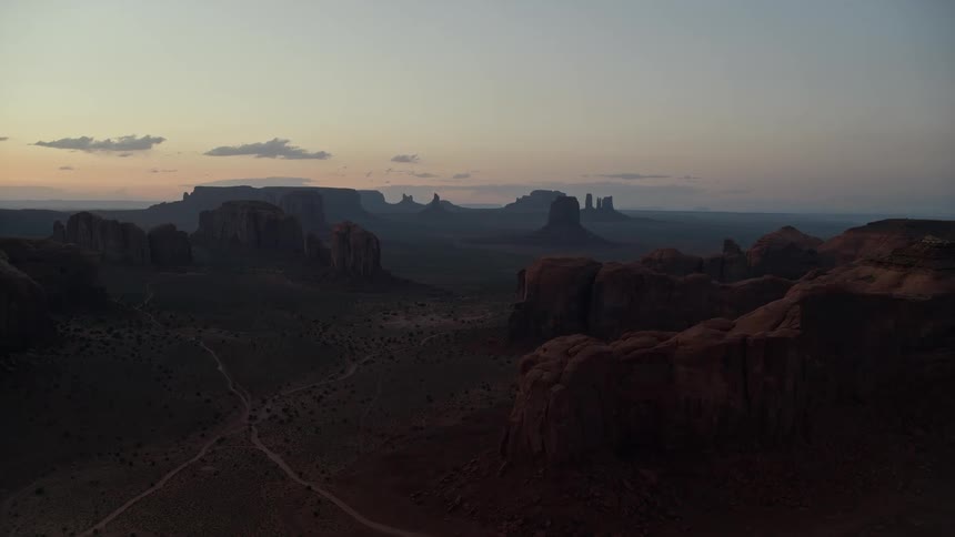 Red rock formations plateaus and mesas at dusk