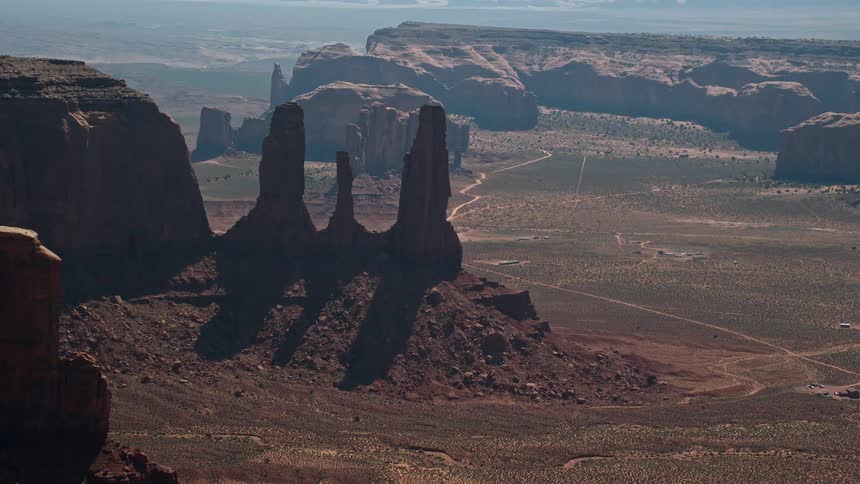 Aerial view of mountains and mesas in the desert badlands