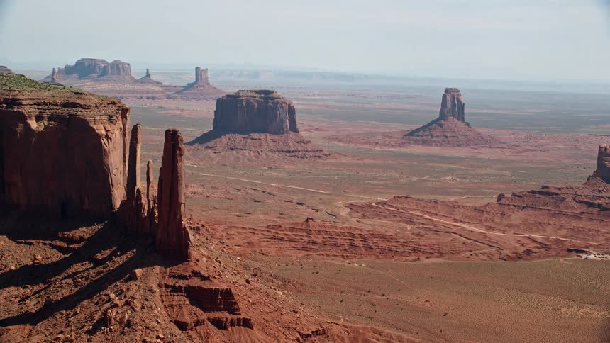 Aerial of the desert with red mountains during the day