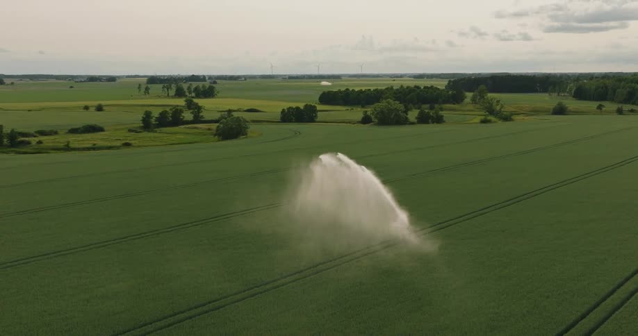 Aerial view of irrigation system watering crops on a farm