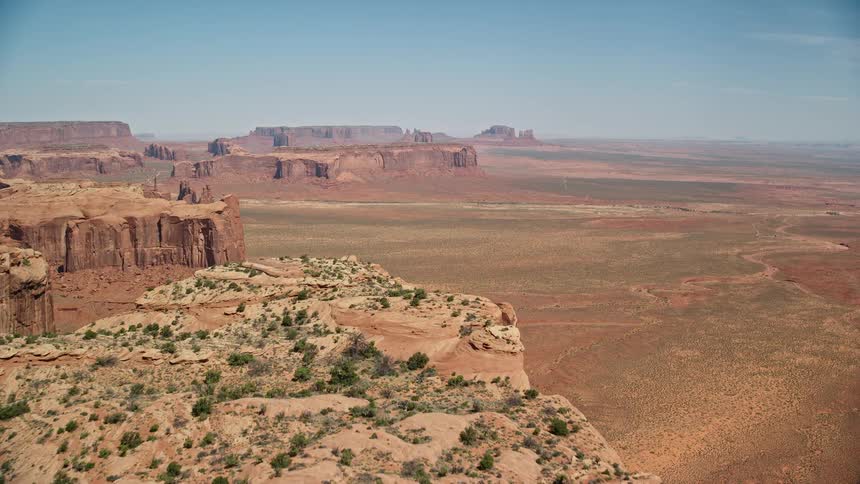 Aerial view of a valley and cliffs with geological formations