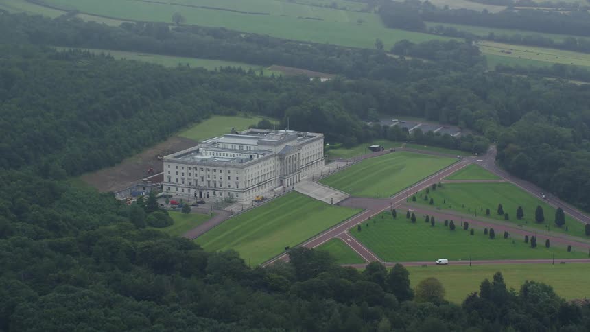 Aerial view of a stately manor in the countryside