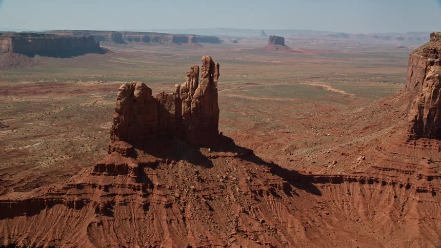 Aerial view of desert plateau with hills and a rocky terrain