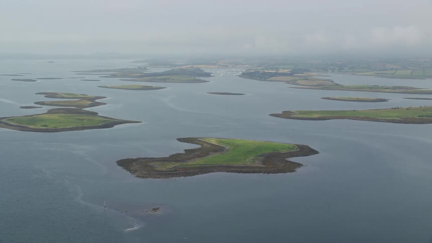 Aerial view of the sea with scattered small islands