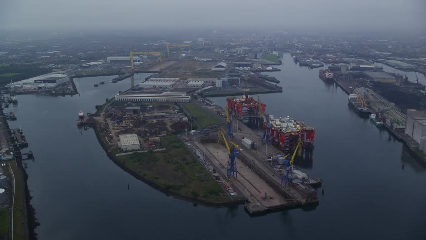 Aerial view of large shipping docks on a river