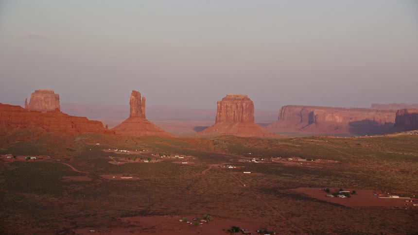 The sandstone buttes of monument valley on a hazy day