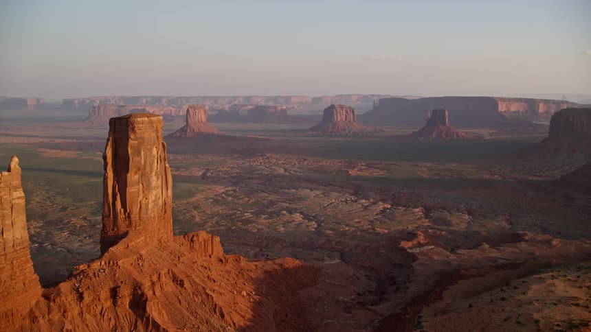 Aerial view of a canyon with natural and geological rock formations and cliffs
