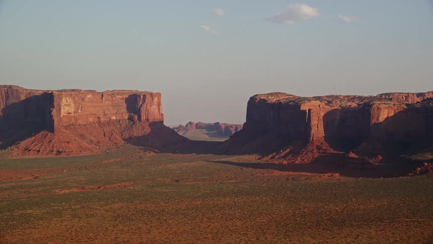 A mesa rock formation in a desert