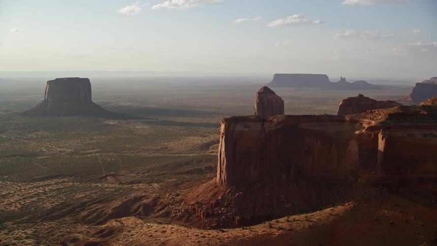Aerial view of the plateaus rising amidst the vast desert