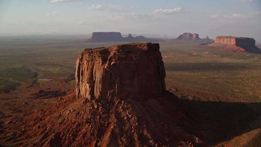 A mesa rock formation in a desert