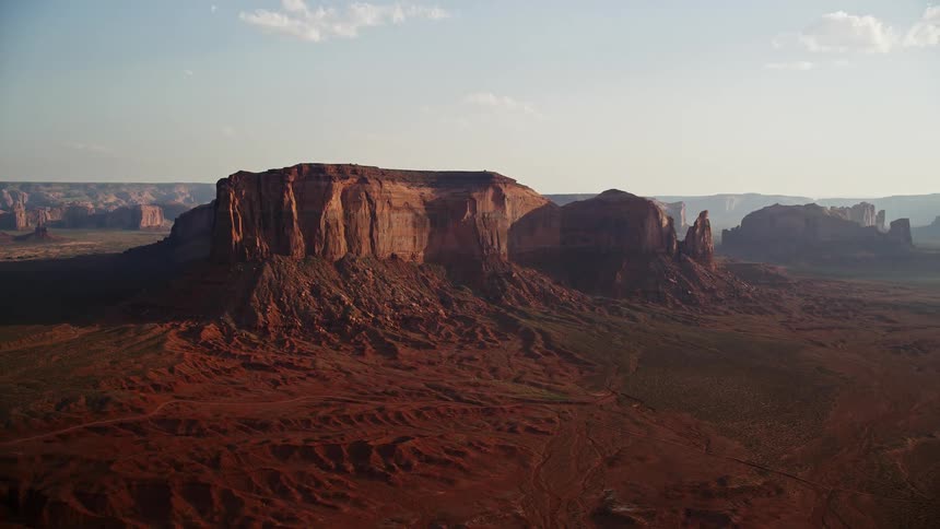 Aerial of a desert region with rock formations at daytime