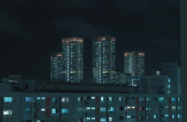 Lights turn off and go out on the city skyline at night