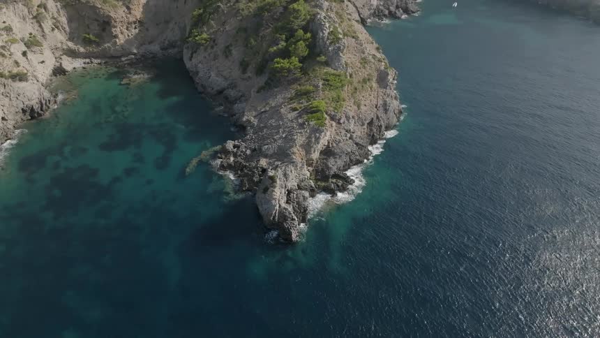 Aerial of a small island at midday