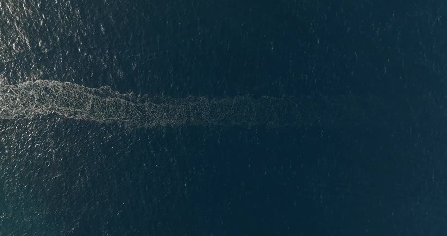 Aerial view of a sea with ripples and waves