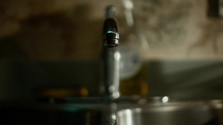 The sink is dripping water
