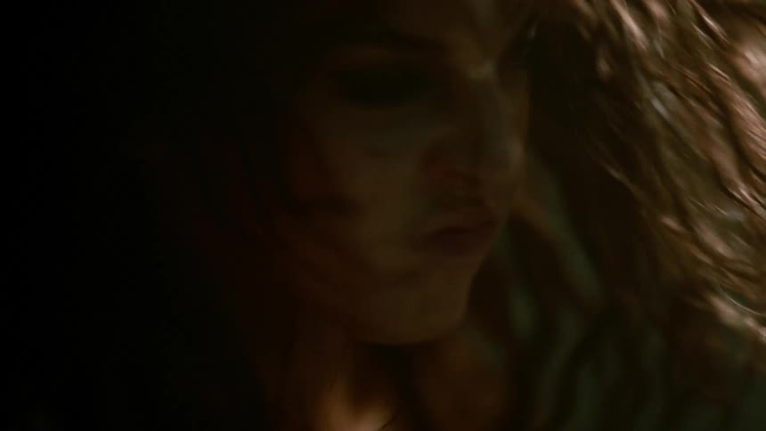 Closeup of a young womans face shaking her head