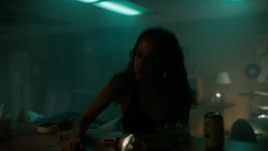 An angry girl punching a counter