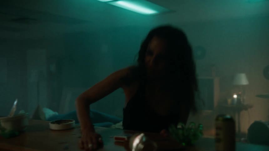 Angry young rocker teen hits the countertop and grabs a beer