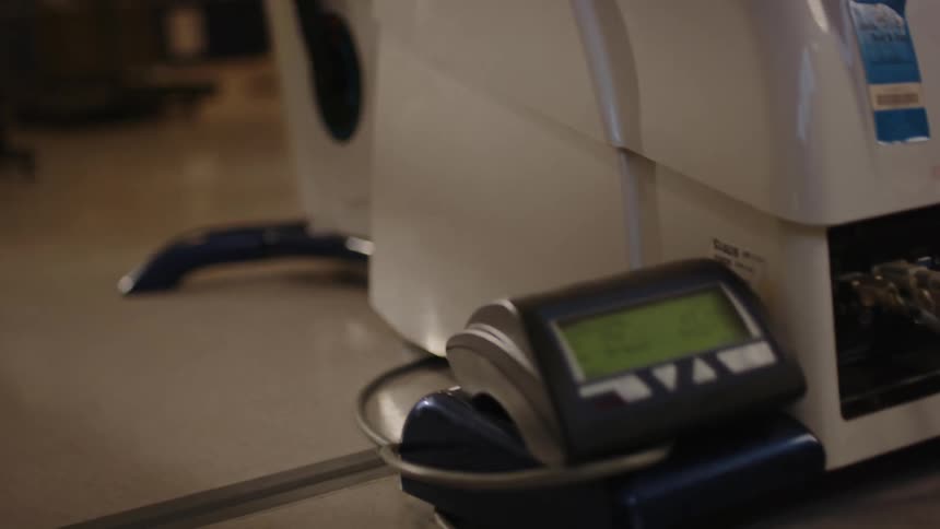 Feet pedaling on a stationary bike