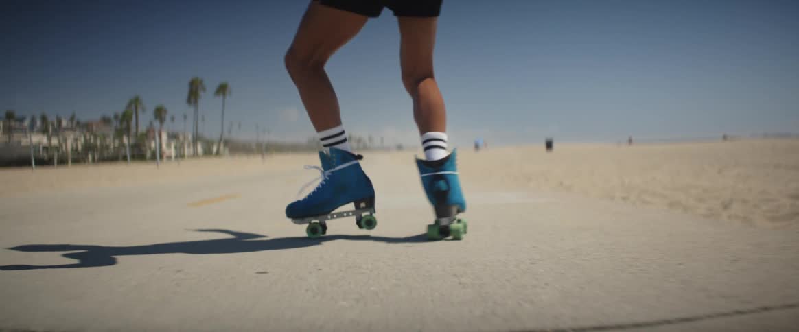 A person rollerblading on the beach bike path