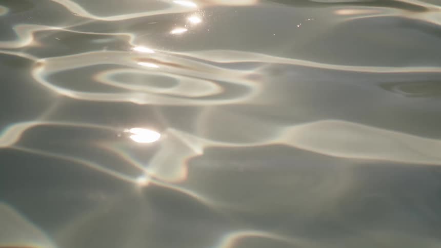 Sunlight reflecting off the ocean with gentle ripples