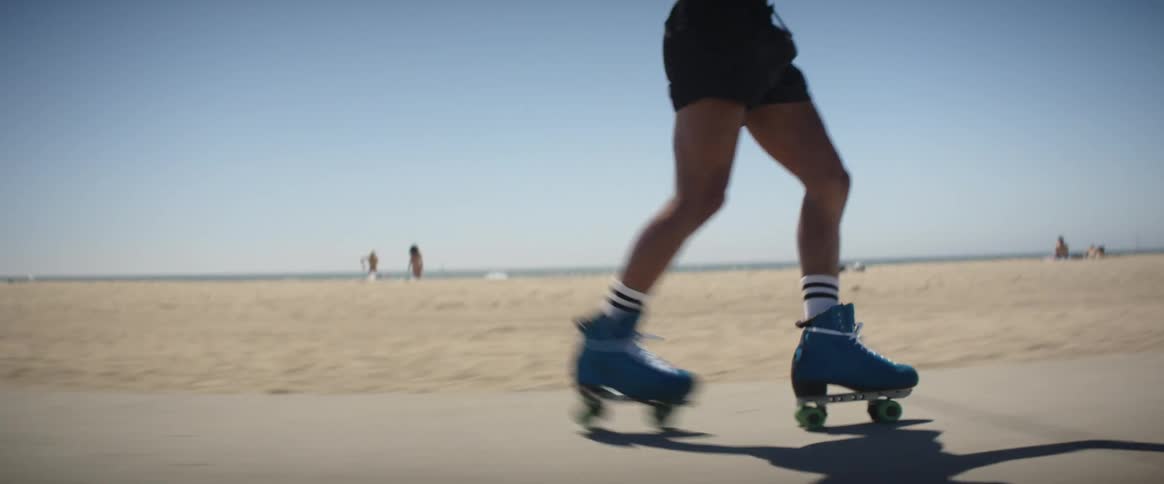 Person rollerblading on the beach bike path