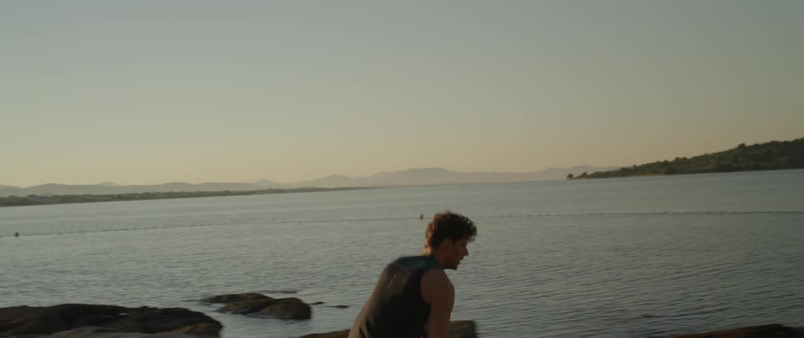 A man running beside the shore