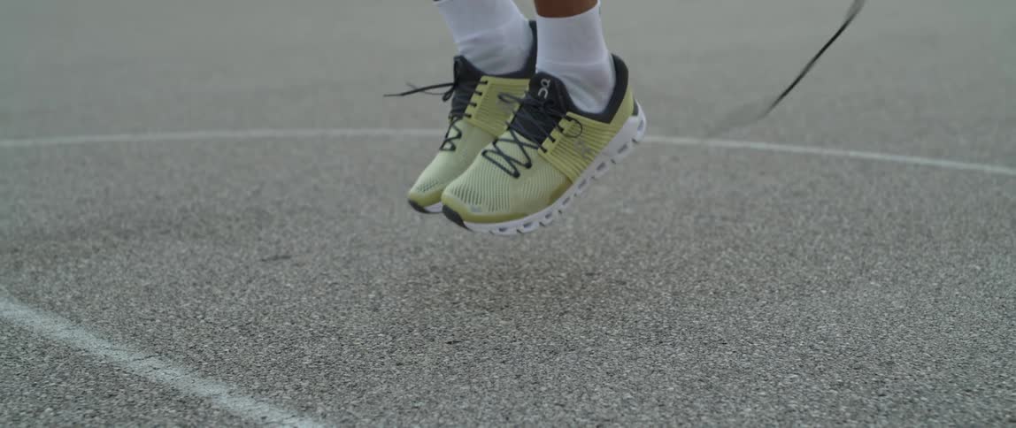 Closeup of a persons legs skipping rope