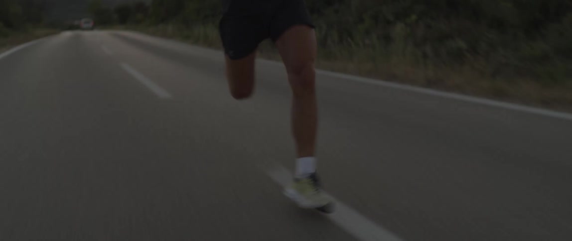 A man is running down the road