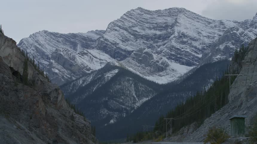 A tall mountain ahead is covered with snow