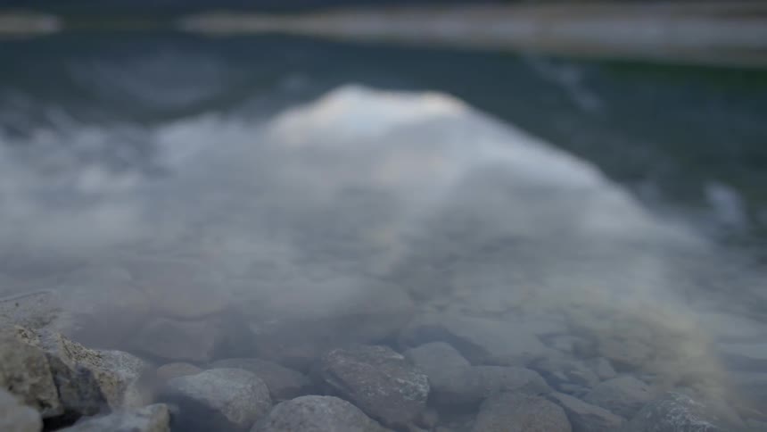 Rocks can be seen under the water
