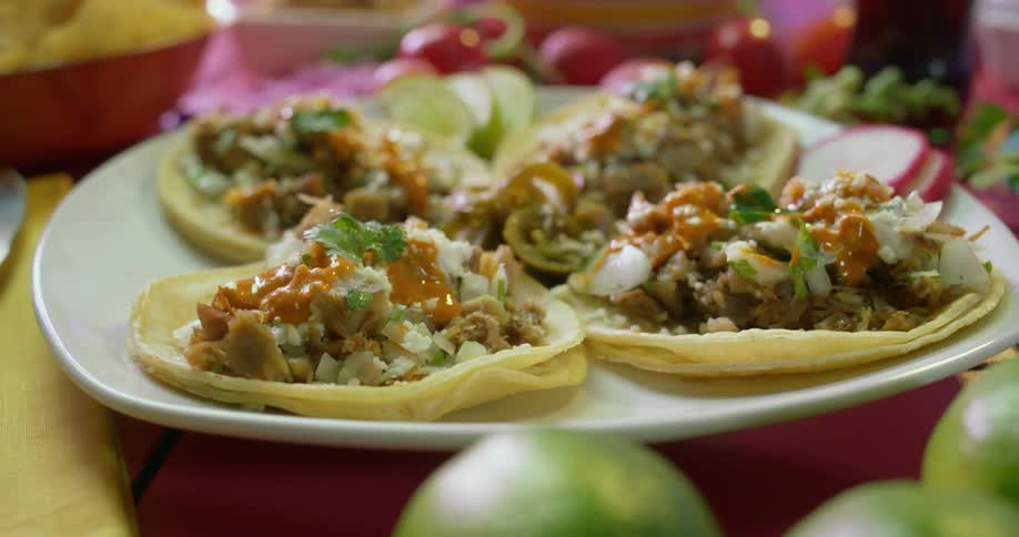 A taco dish with vegetables and tortilla