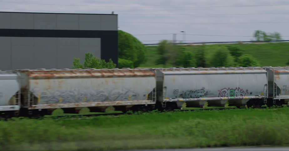 Train containers are parked by the storage facility