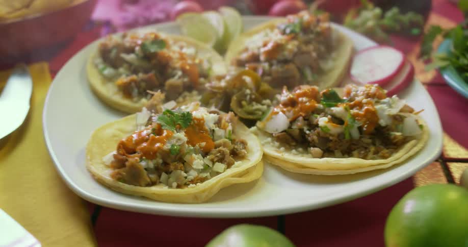 Smoking hot plates of tortillas served on a table