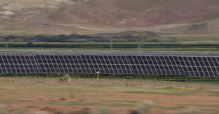 Solar panels on roadside farm land