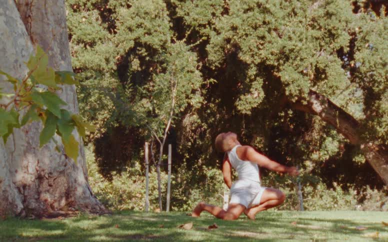 A woman dancing in the garden