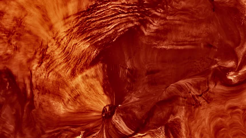 Abstract red liquid texture in motion