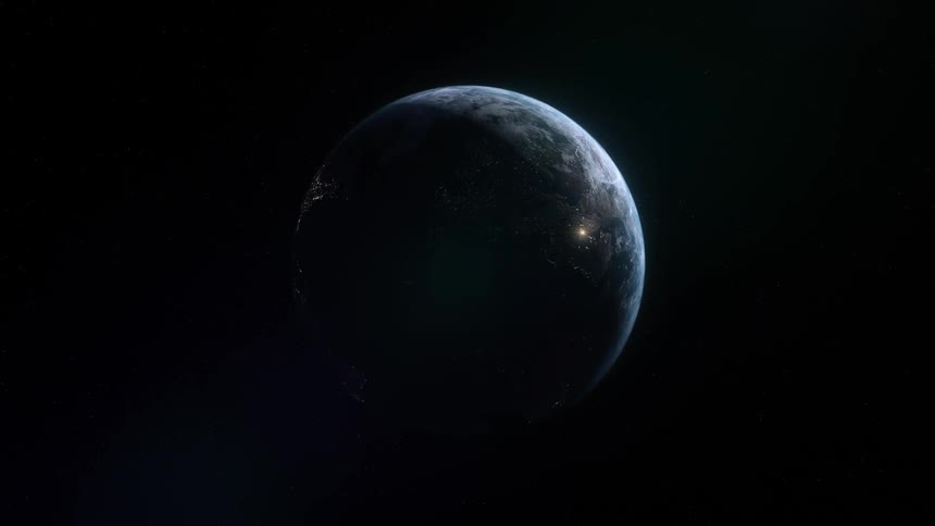 A view of the planet earth orbiting during a nighttime period on earth