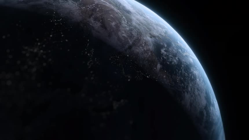 Aerial of a rotating planet in space