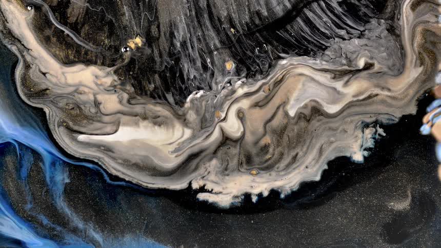 Sea waves hit the shore at night