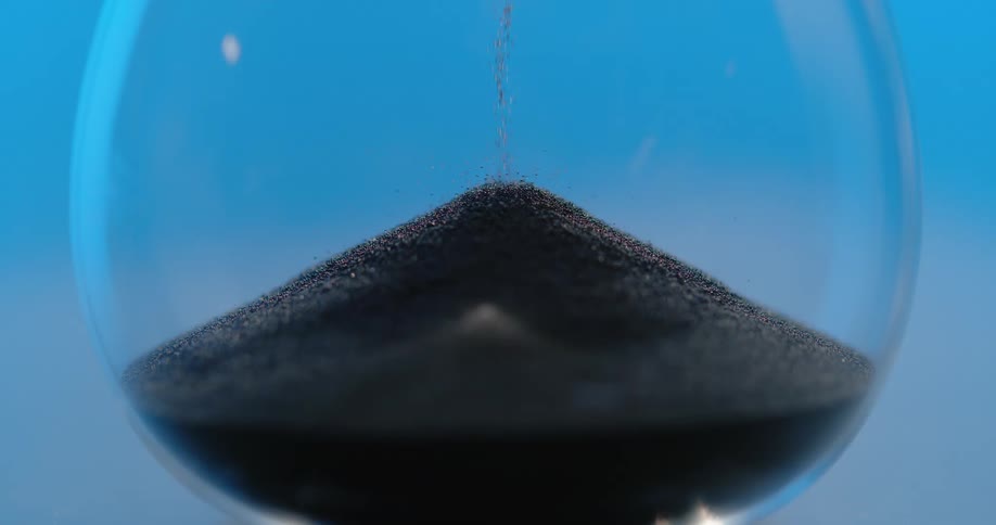A close up video of an hour glass