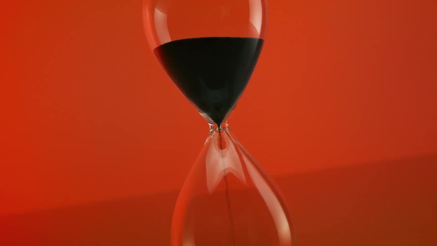 The sand is falling in the hourglass